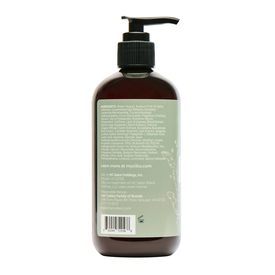 Brown bottle with pump and green label on a white background