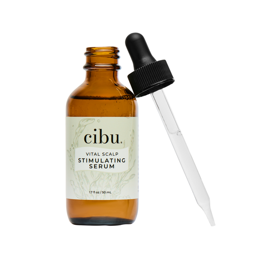 Cibu vital scalp stimulating serum bottle with dropper on a white background