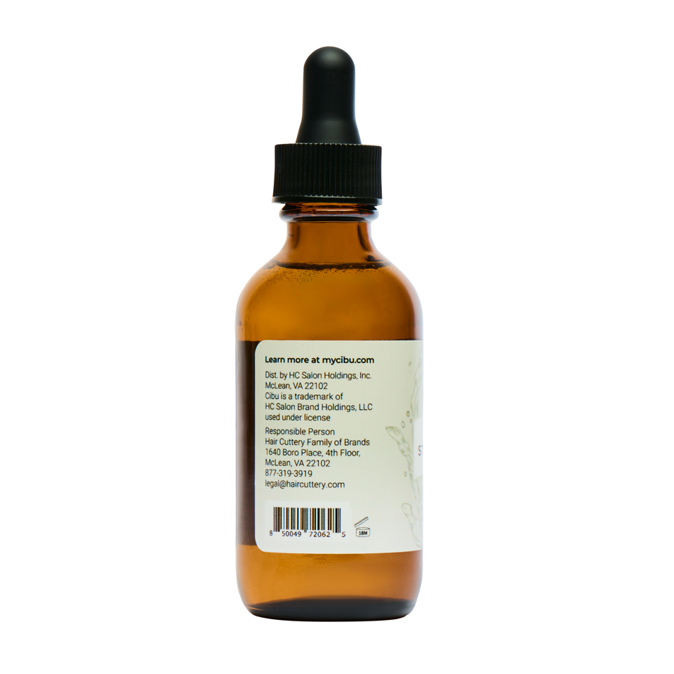 Brown glass bottle with black dropper on a white background