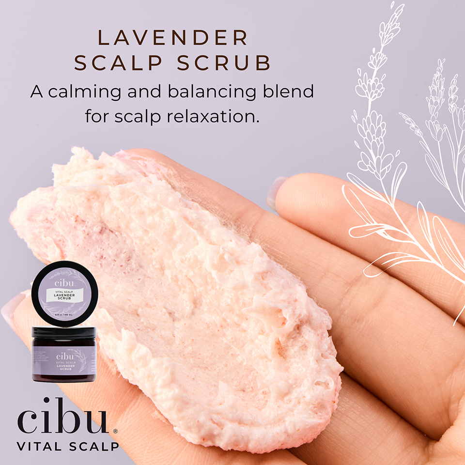 Lavender scalp scrub held in a hand with product packaging and branding visible.